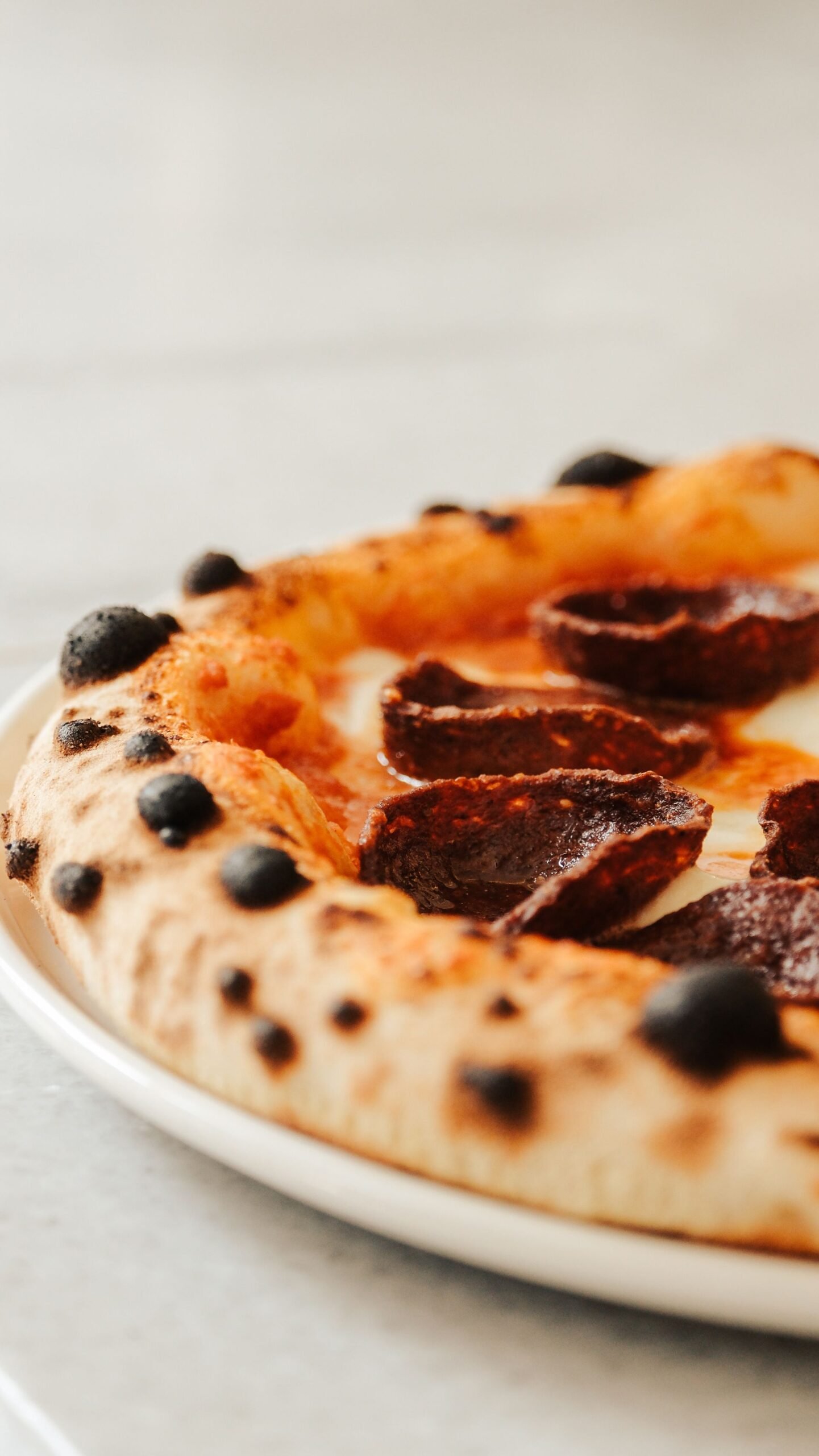Close-Up of Pepperoni Pizza with Crispy Crust