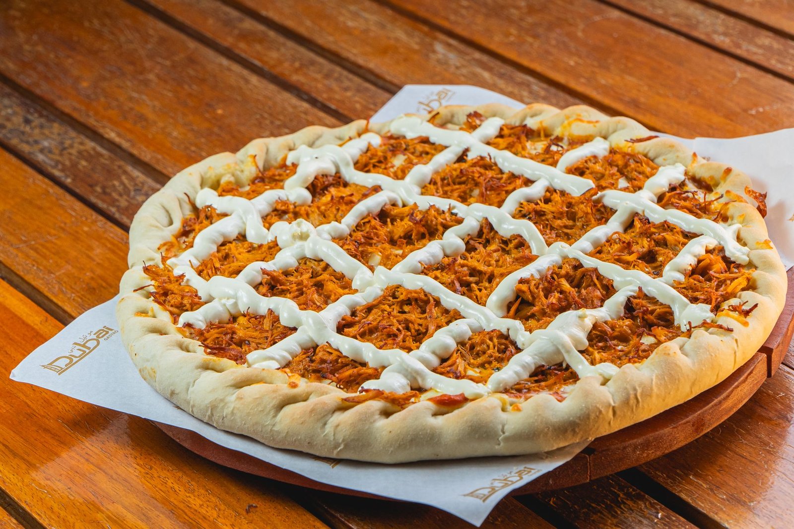 Delicious Barbecue Chicken Pizza on Wooden Table