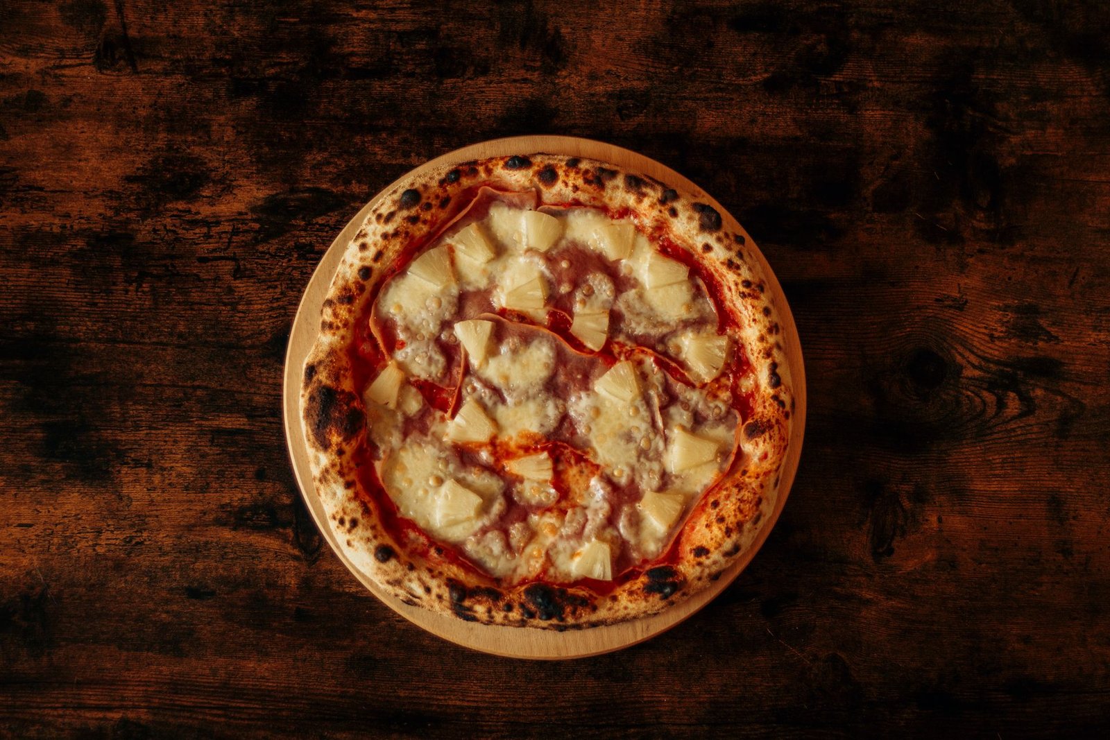 Delicious Hawaiian Pizza on Rustic Table