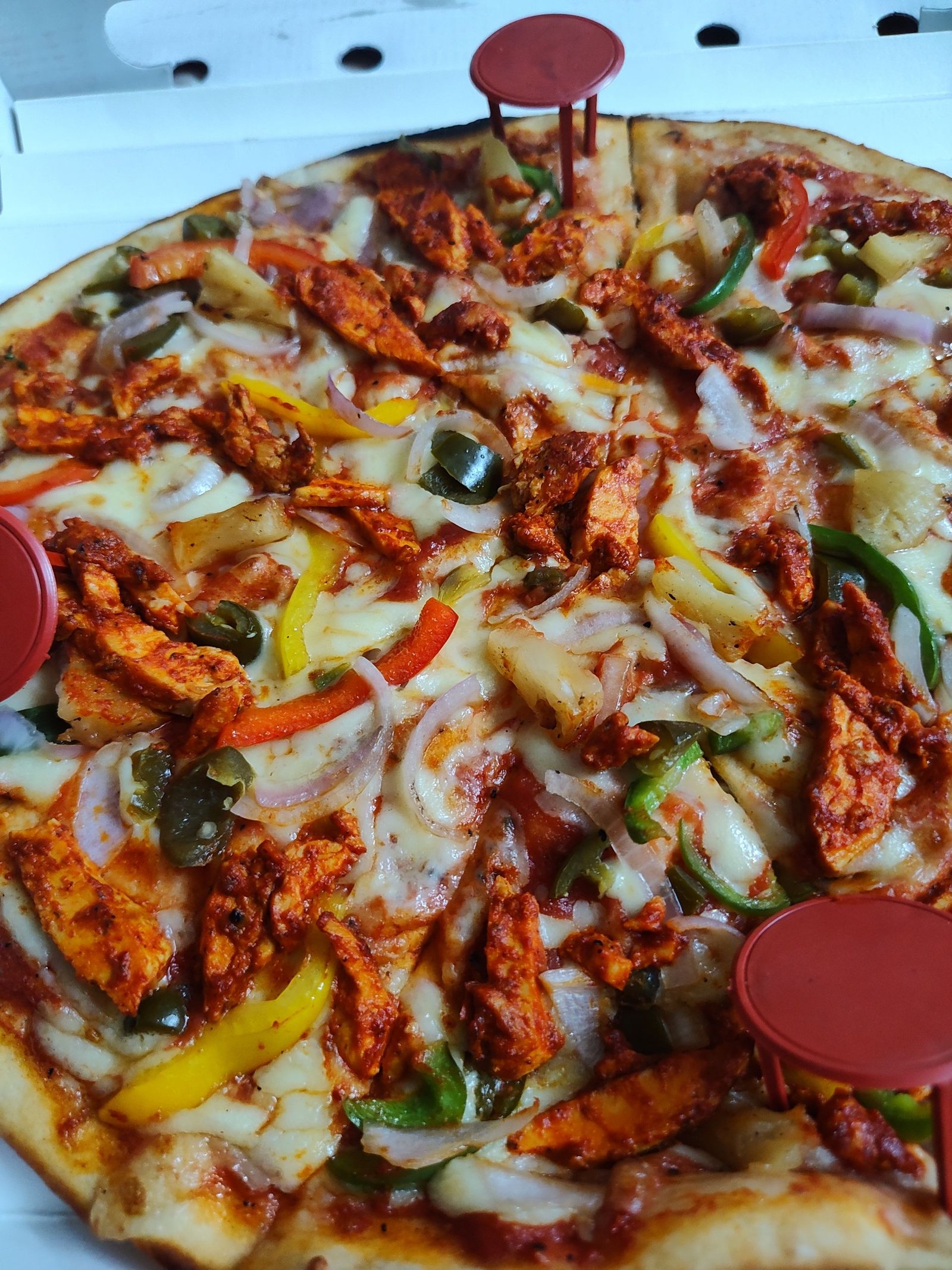 Spicy Chicken Pizza with Peppers and Cheese