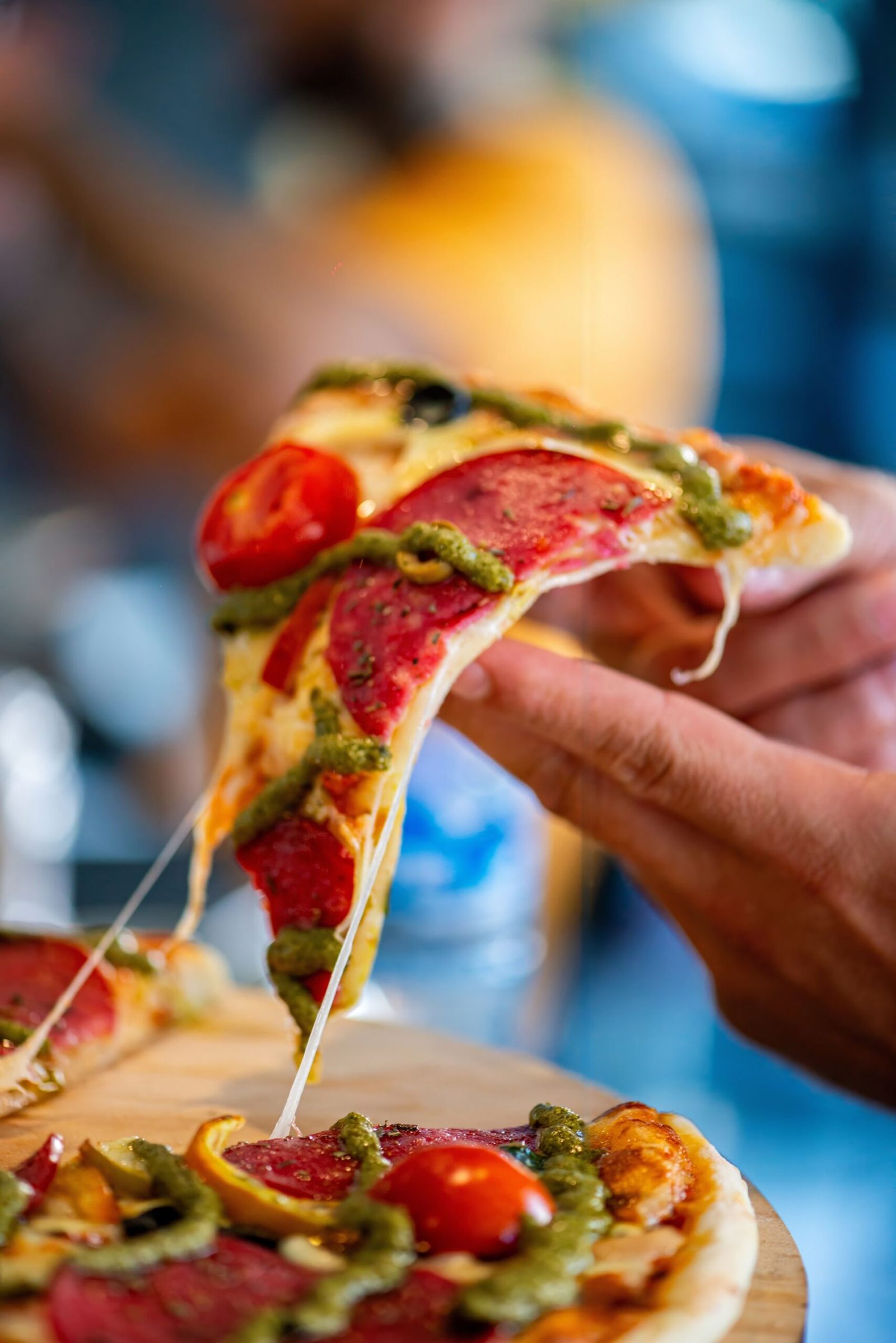 Slice of Pizza in Hand