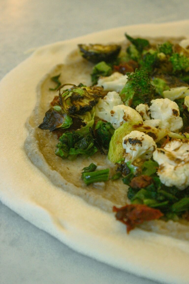 Fresh Vegetable Pizza Preparation with Cauliflower