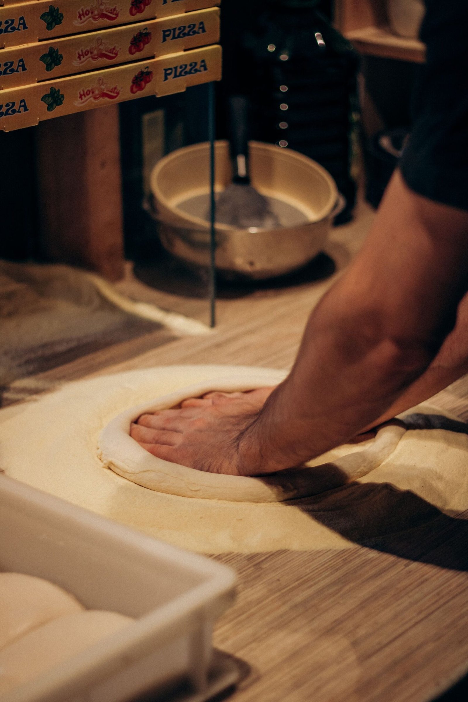 Making Pizza Dough in a Cozy Kitchen Setting