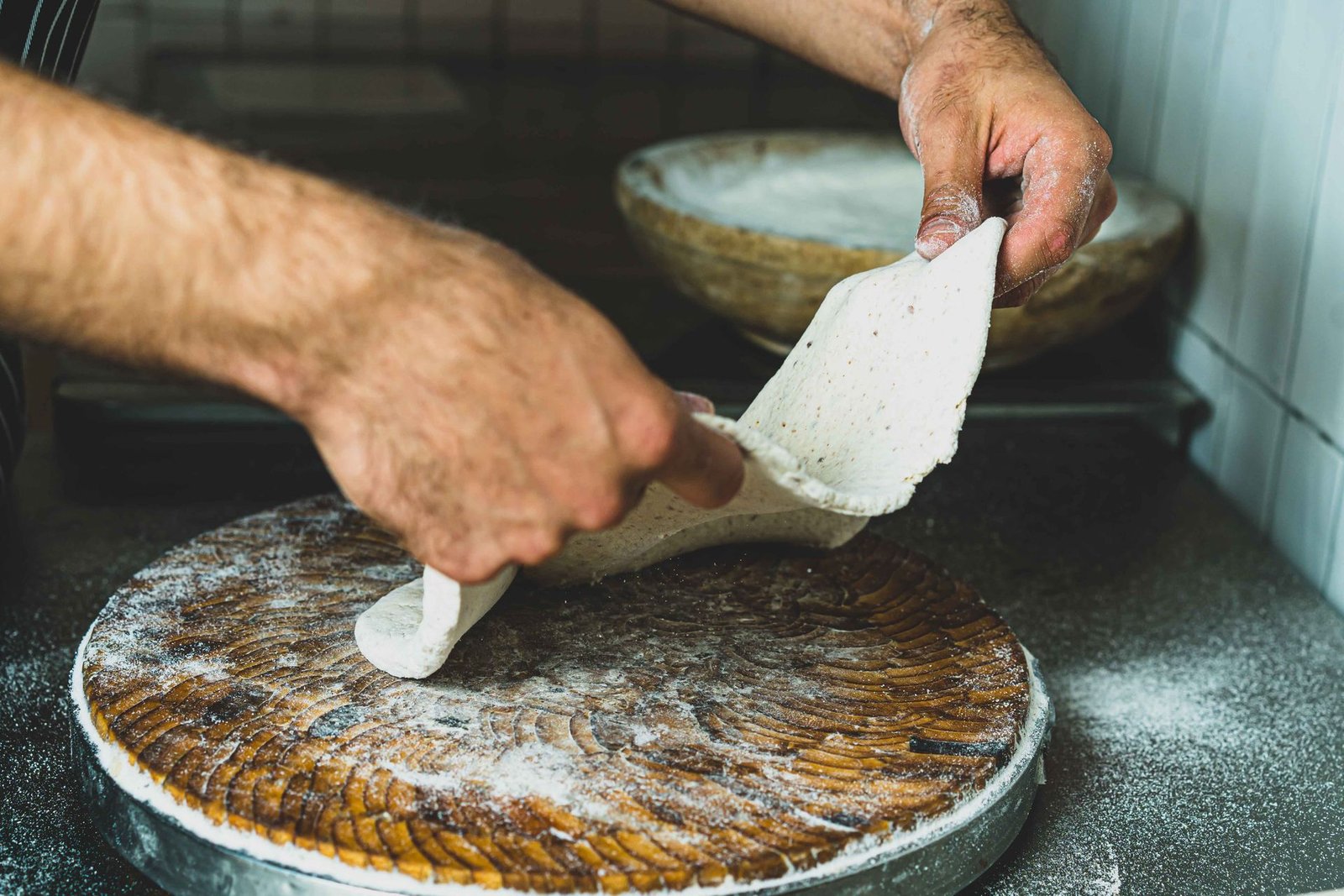 Artisan Making Handmade Pizza Dough in Kitchen