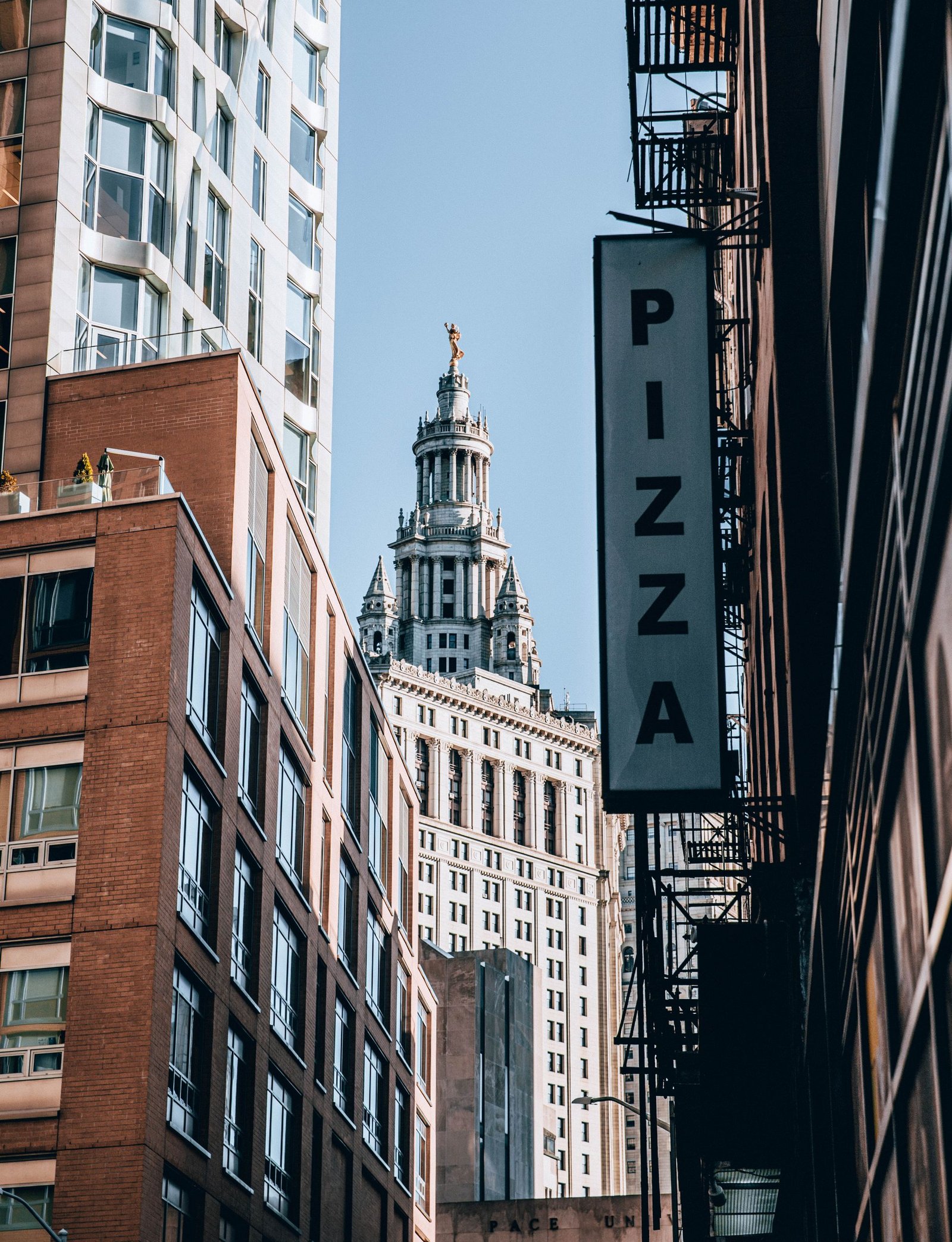 New York City Urban Street View with Pizza Sign