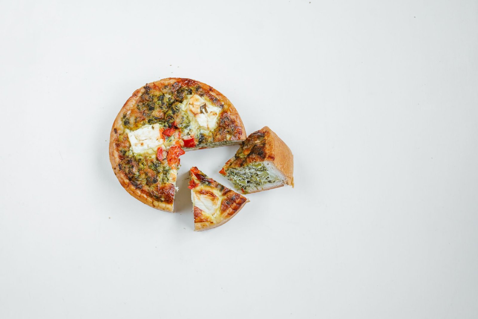 Sliced Vegetarian Deep Dish Pizza