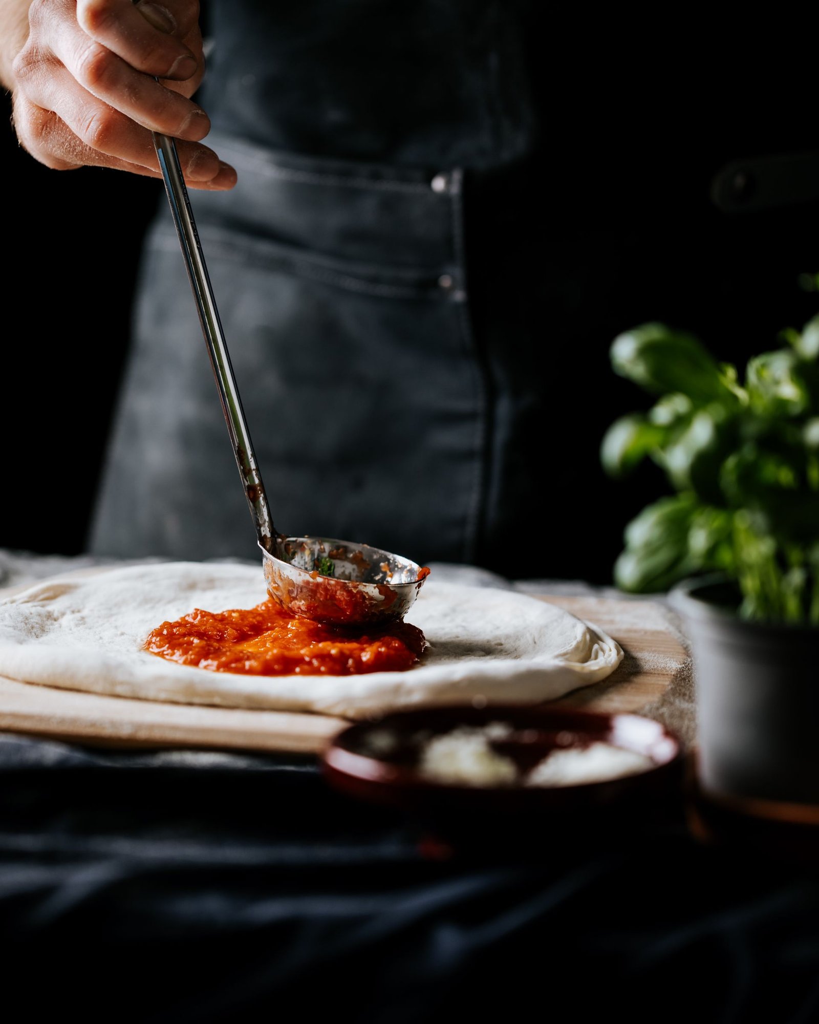 Artisan Pizza Preparation with Fresh Ingredients