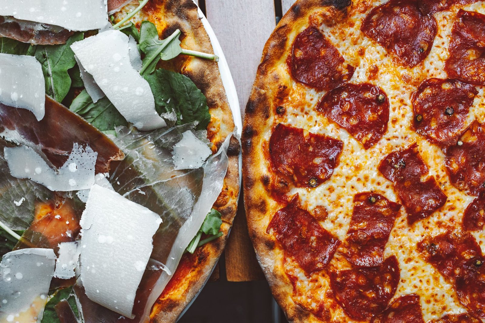 Close up of Two Pizzas