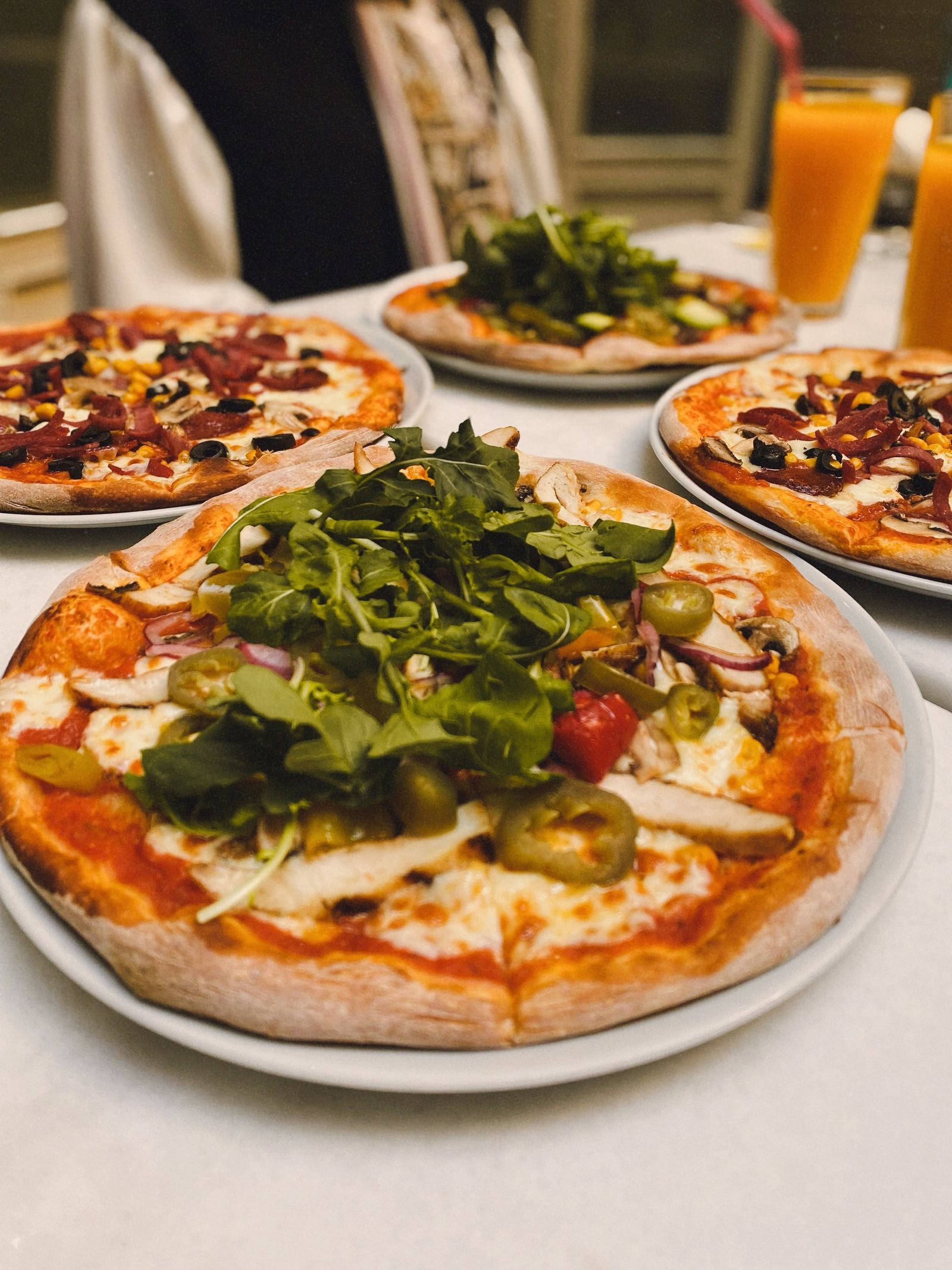 Delicious Assorted Pizzas with Fresh Ingredients