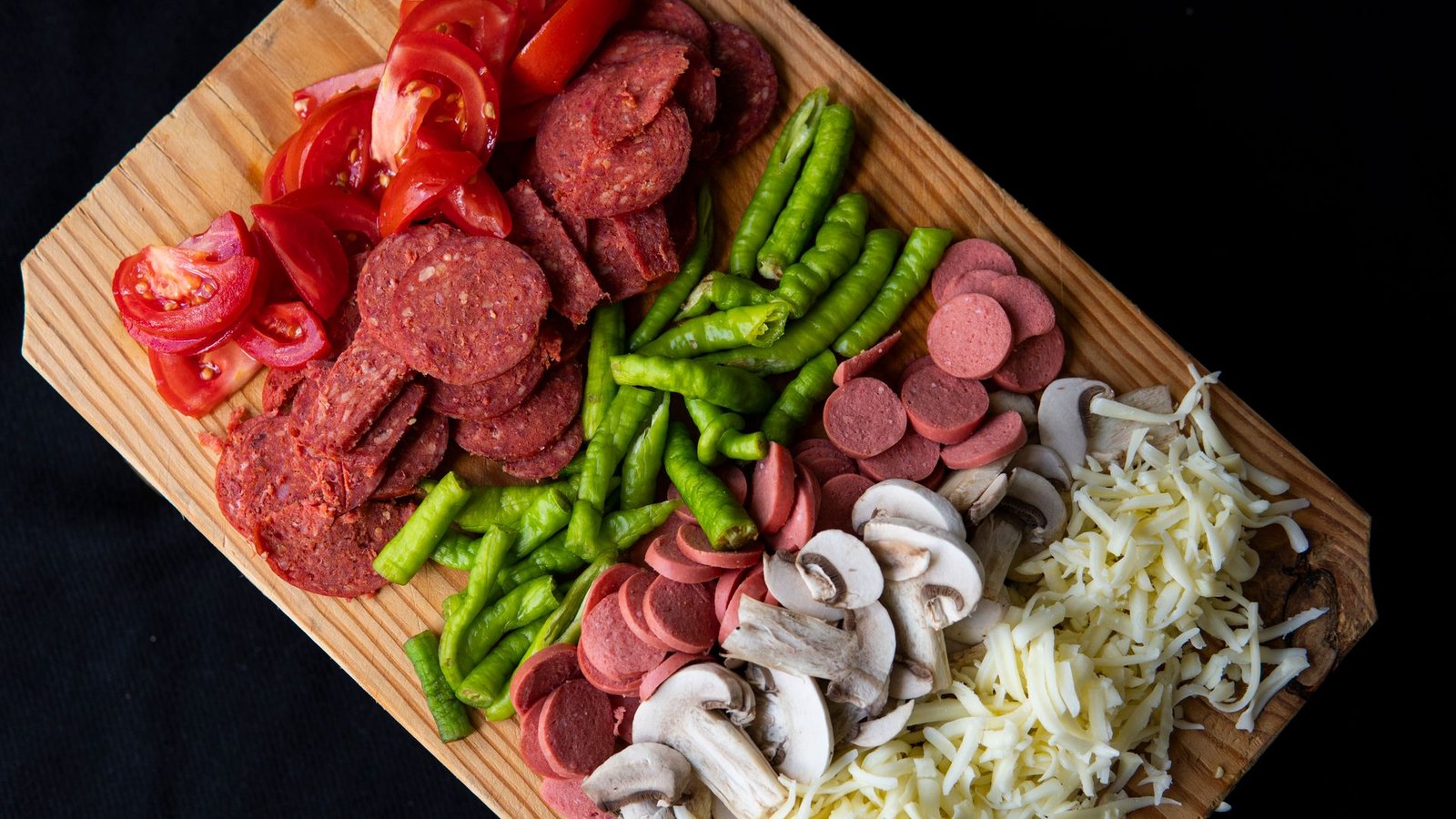 Sliced ingredients on cutting board