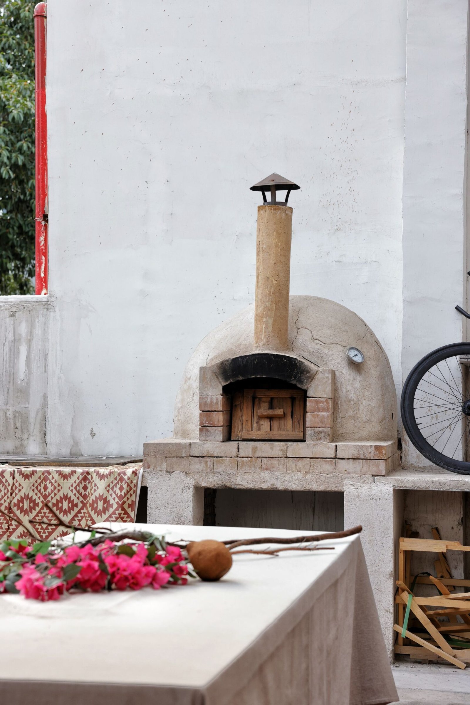Rustic Outdoor Pizza Oven with Flowers