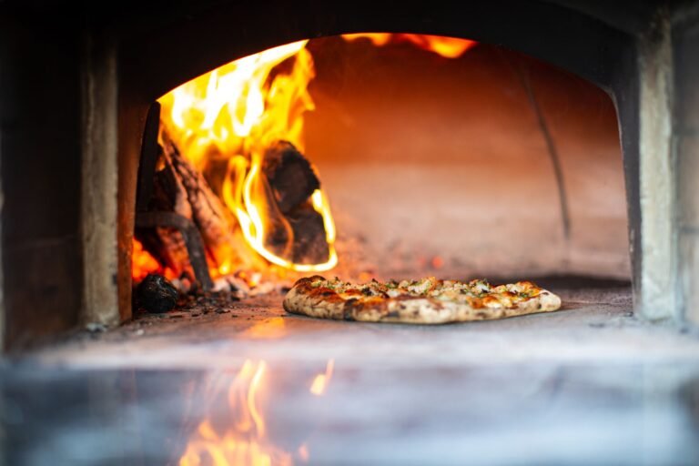 Artisan Pizza Baking in Wood-Fired Oven