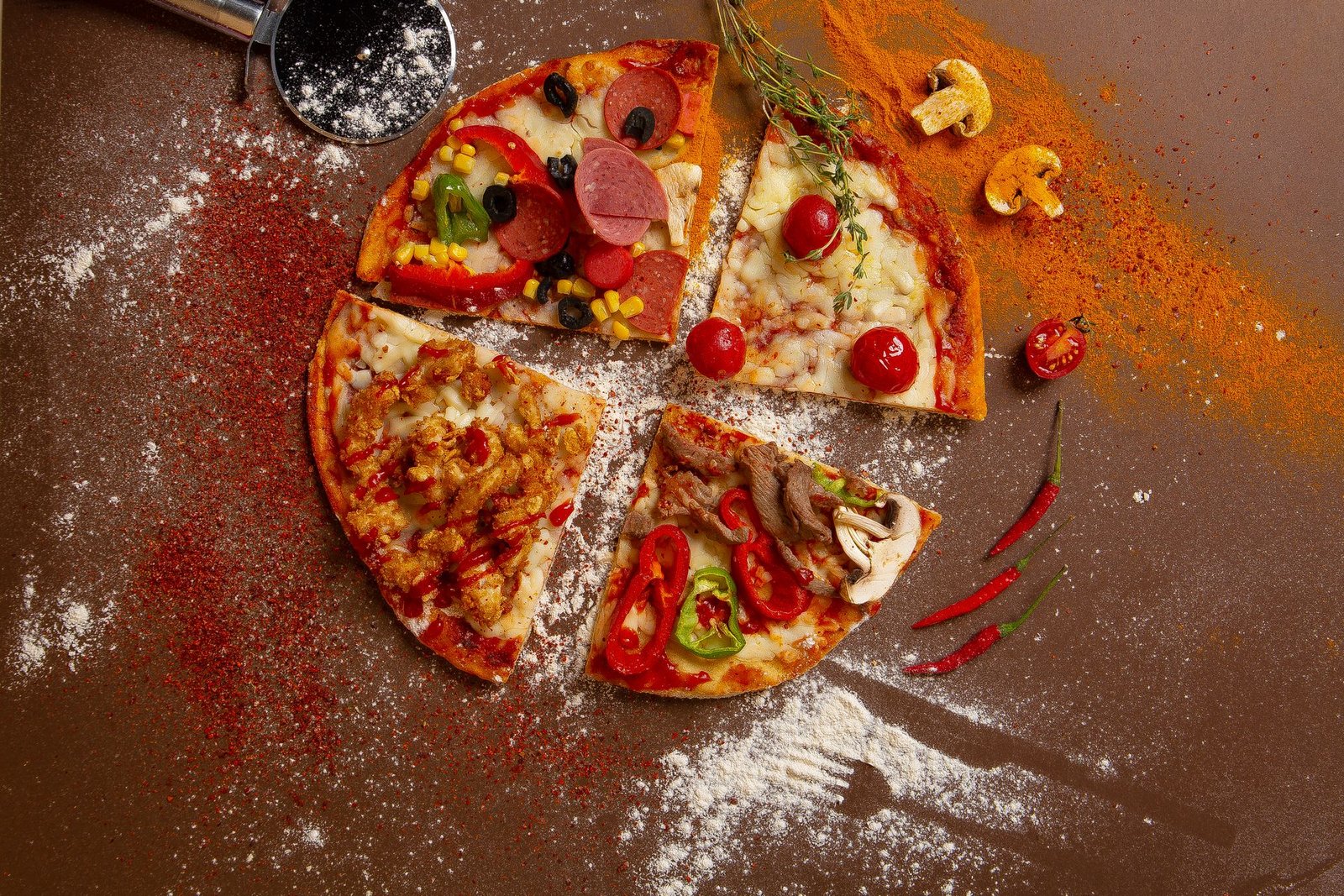 Four Delicious Pizza Slices with Toppings