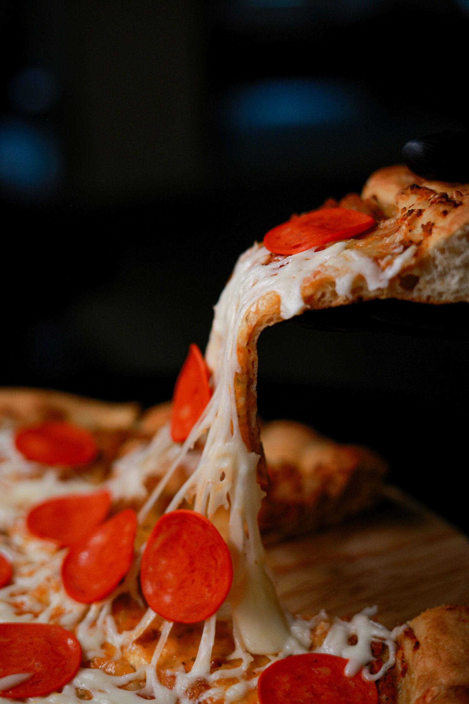 Delicious Pepperoni Pizza Slice with Melting Cheese