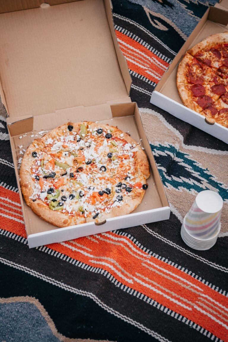 Pizza on Brown Cardboard Box