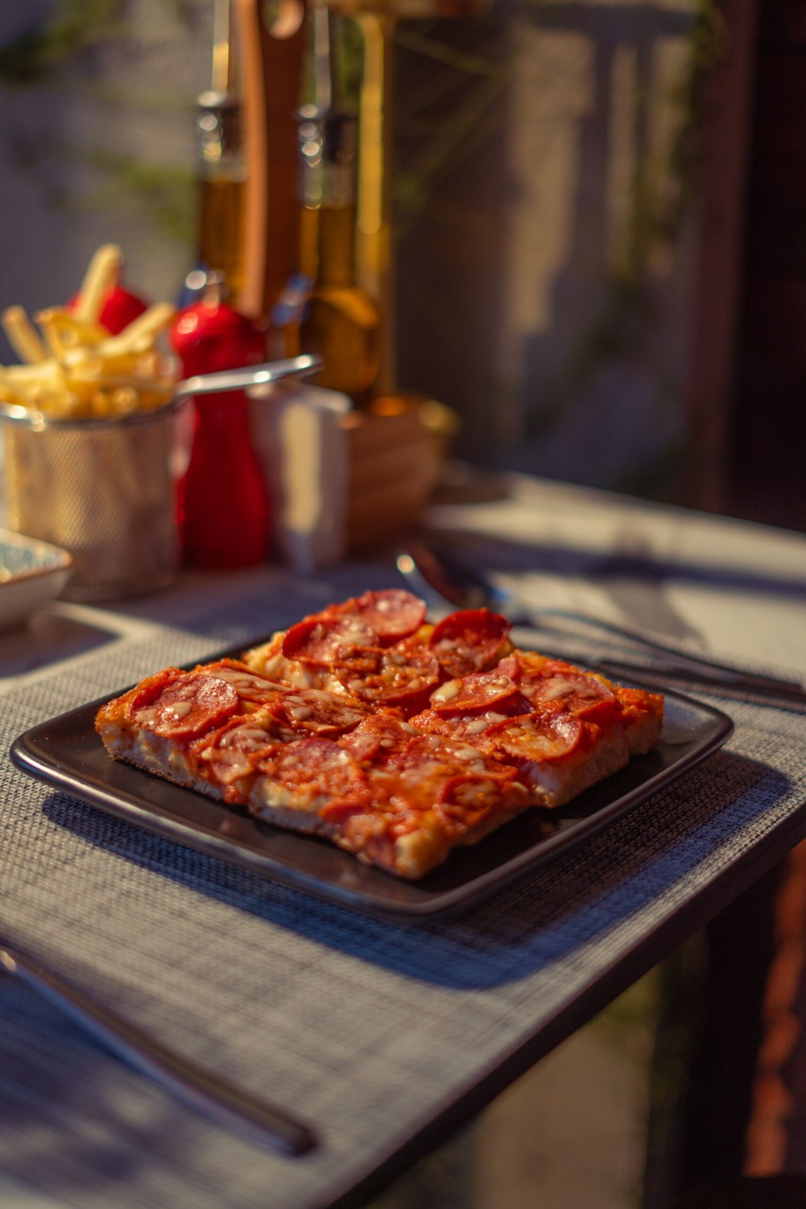 Delicious Pepperoni Pizza on Outdoor Table