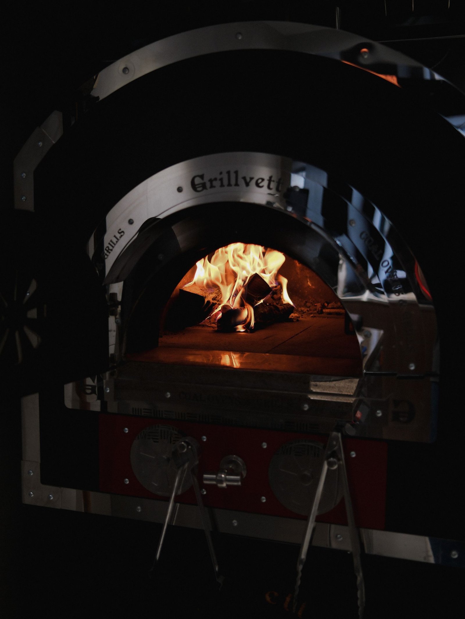 Rustic Wood-Fired Oven with Burning Flames