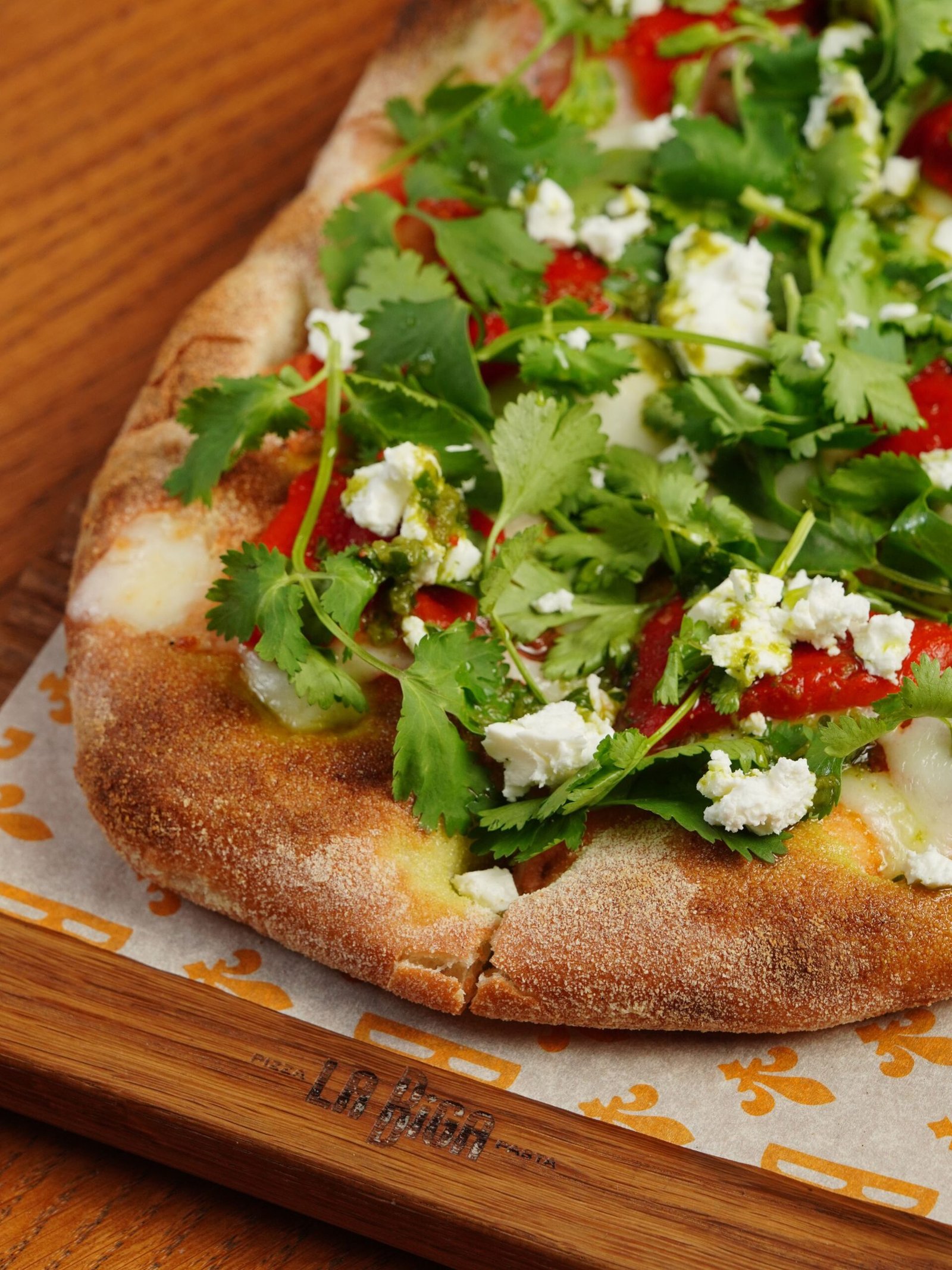 Close-up of Pinsa with Greens and Ricotta Cheese 